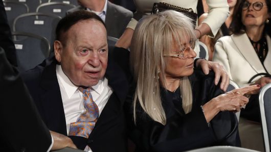 Las Vegas casino magnate Sheldon Adelson sits with his wife Miriam as they await the start of the first debate between Republican U.S. presidential nominee Donald Trump Democratic and U.S. presidential nominee Hillary Clinton at Hofstra University in Hempstead, New York, U.S., September 26, 2016.