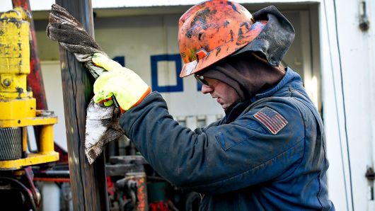 A worker on a an oil drill near New Town, North Dakota.