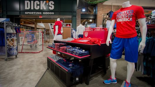 Mannequins stand next to merchandise displayed for sale at a Dick's Sporting Goods store in West Nyack, New York.