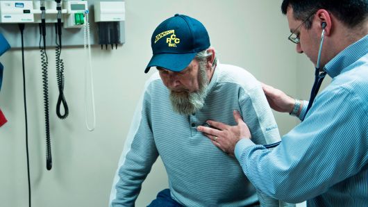 Don Humbertson, a 64 year old lung cancer surviver, is examined by Dr. Wade Harvey at the Clay-Battelle Community Health Center March 21, 2017 in Blacksville, West Virginia.