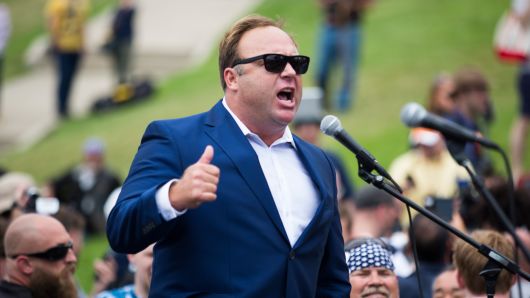 Conspiracy theorist and radio talk show host Alex Jones speaks during a rally in support of Donald Trump near the Republican National Convention, July 18, 2016 in Cleveland, Ohio.