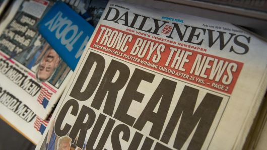 A copy of Tuesday's New York Daily News sits on the shelf of a newsstand, September 5, 2017 in New York City. Tronc, the publisher of the Chicago Tribune and, formerly, The Los Angeles Times, announced on Monday that it had purchased The New York Daily News. 