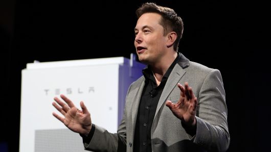 Tesla Motors CEO Elon Musk unveils large utility scale home batteries at the Tesla Design Studio in Hawthorne, California, April 30, 2015. 