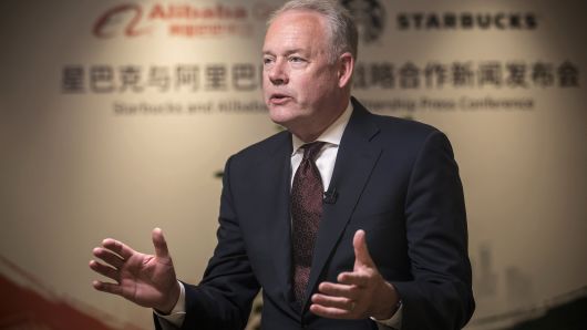 Kevin Johnson, chief executive officer of Starbucks Corp., speaks during a Bloomberg Television interview in Shanghai, China, on Thursday, Aug. 2, 2018. Starbucks is joining forces with Alibaba Group Holding Ltd. to begin delivering its drinks and baked goods in China, rolling out an effort to stave off competitors and turn around sales in the country. 