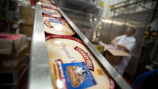 Packages of vanilla ice cream move along a conveyer belt at Turkey Hill LP's production facility in Contestoga, Pennsylvania.