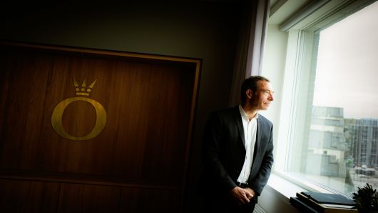Anders Colding Friis, chief executive officer of Pandora AS, poses for a photograph in his office at the company's headquarters in Copenhagen, Denmark, on Monday, July 9, 2018. Pandora designs, manufactures, markets, and distributes hand finished and modern jewelry made from primarily sterling silver, gold, and precious and semi-precious stones.