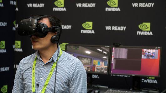 Simpson Chung uses a virtual reality headset during the NVIDIA GPU Technology Conference, which showcases artificial intelligence, deep learning, virtual reality and autonomous machines, in Washington, DC. 