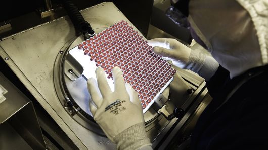 An employee works on the production of insulin pens at the factory of the US pharmaceutical company Eli Lilly in Fegersheim, France.