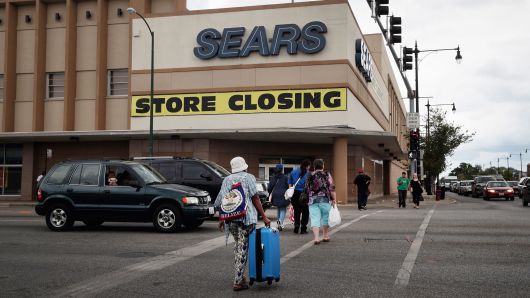 A sign announcing the store will be closing hangs above a Sears store in Chicago, Illinois.