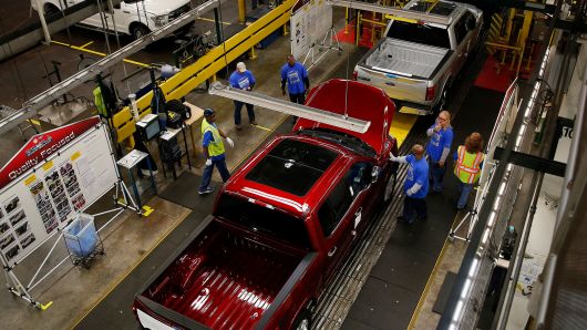 Ford Motor Co. F150 trucks move along the production line at the company's Dearborn Truck Assembly facility in Dearborn, Michigan.