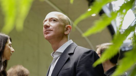 Chief Executive Officer of Amazon, Jeff Bezos, tours the facility at the grand opening of the Amazon Spheres, in Seattle, Washington on January 29, 2018. 