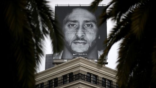 A billboard featuring former San Francisco 49ers quaterback Colin Kaepernick is displayed on the roof of the Nike Store on September 5, 2018 in San Francisco, California. 