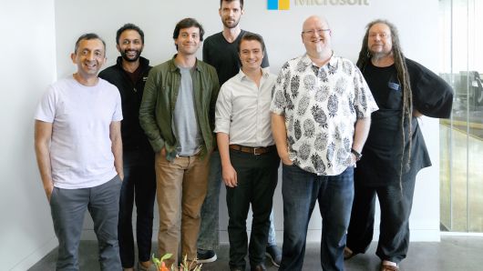 The Lobe team, along with Microsoft's Umesh Madan, left; Gaz Iqbal, second from left; Kevin Scott, second from right; and Jaron Lanier, right.
