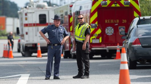 Police block off roads after an unidentified assailant opened fire at a warehouse complex September 20, 2018 in Aberdeen, Maryland, killing and wounding multiple people, authorities said.