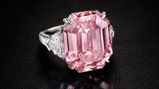 The 18.95 carat, fancy vivid pink stone is a rectangular cut and is called The Pink Legacy. 