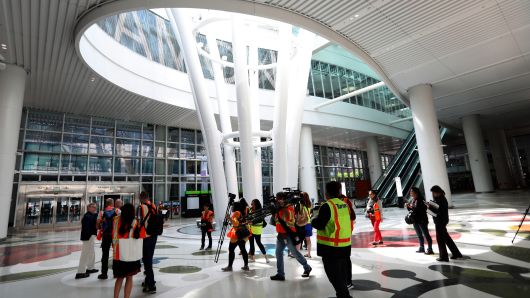 Chief architect of the new $2.26 billion Transbay Transit Center, Fred Clarke, far left, leads a press tour through the Grand Hall of the project in downtown San Francisco, Calif., on Wednesday, Aug. 8, 2018. The facility opens to the public next week.  (Karl Mondon/Bay Area News Group via Getty Images)