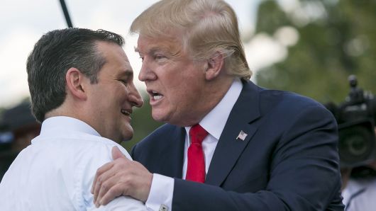 Republican presidential candidate Donald Trump greets fellow candidate Sen. Ted Cruz, R-Texas, at a rally organized by Tea Party Patriots on Capitol Hill in Washington, Wednesday, Sept. 9, 2015, to oppose the Iran nuclear agreement.