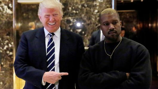 President-elect Donald Trump and musician Kanye West pose for media at Trump Tower in Manhattan, New York City, U.S., December 13, 2016.