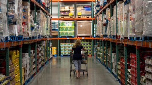 A woman pushes a cart while shopping at a Costco Wholesale Corp. store in Hackensack, New Jersey. 