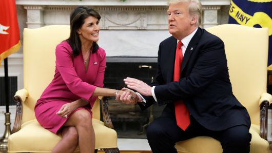 President Donald Trump meets with outgoing U.S. Ambassador to the United Nations Nikki Haley in the Oval Office of the White House, Tuesday, Oct. 9, 2018, in Washington.