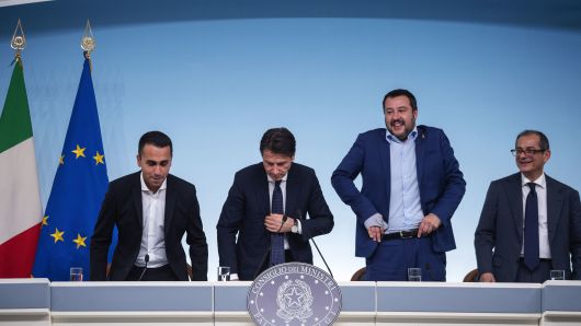 Deputy Prime Minister and Labour Minister Luigi di Maio(L), Italian Prime Minister Giuseppe Conte(2L), Italian deputy Prime Minister and Interior Minister Matteo Salvini(2R) and Italian Economy and Finances Minister Giovanni Tria(R) hold a press conference on the Italian budget on October 15, 2018 in Rome, Italy.