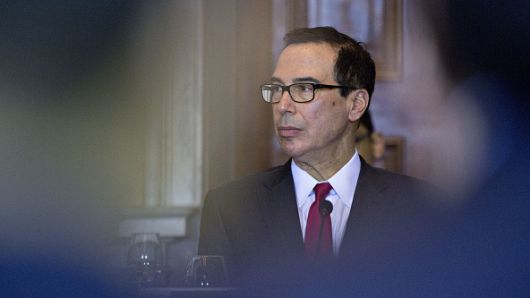 Steven Mnuchin, U.S. Treasury secretary, listens during a Financial Stability Oversight Council (FSOC) meeting at the U.S. Treasury in Washington, D.C., U.S., on Tuesday, Oct. 16, 2018. 