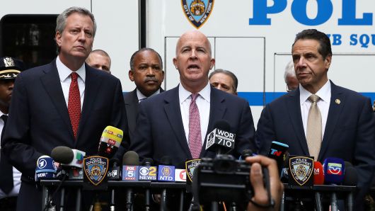 Mayor of New York Bill de Blasio, Police Commissioner of New York City James O'Neill and Governor of New York Andrew Cuomo give a media briefing outside the Time Warner Center in the Manhattan borough of New York City after a suspicious package was found inside the CNN Headquarters in New York, October 24, 2018.