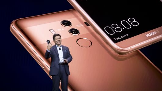 Richard Yu, chief executive officer of Huawei Technologies Co., holds the Mate 10 Pro smartphone while speaking during the company's keynote event at the 2018 Consumer Electronics Show (CES) in Las Vegas, Nevada, U.S., on Tuesday, Jan. 9, 2018. 