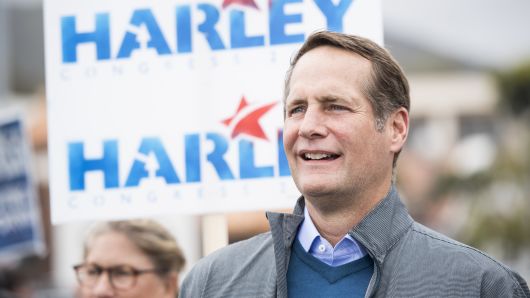 Harley Rouda, Democrat running for California's 48th Congressional district seat in Congress, listens to speakers during his campaign rally in Laguna Beach, Calif., on May 20, 2018. 
