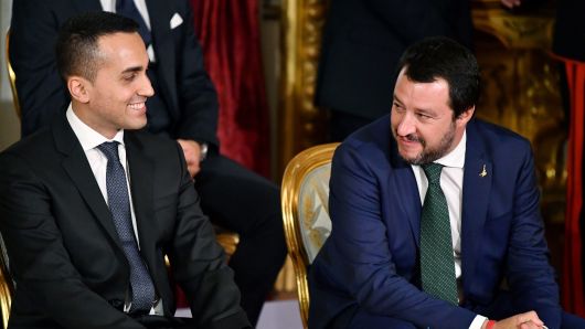 Italys Labor and Industry Minister and deputy PM Luigi Di Maio (L) and Italys Interior Minister and deputy PM Matteo Salvini smile before the swearing in ceremony of the new government at Quirinale Palace in Rome on June 1, 2018. 