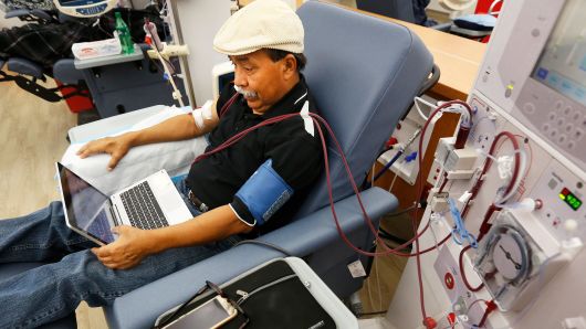 In this photo taken Sept. 24, 2018, Adrian Perez undergoes dialysis at a DaVita Kidney Care clinic in Sacramento, Calif. 