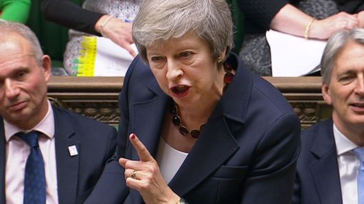 A still image from a video footage shows Britain's Prime Minister Theresa May speaking during Prime Minister's Questions in the House of Commons, in central London, Britain November 14, 2018. 
