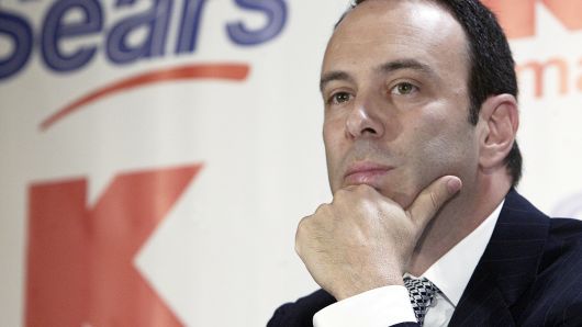 In this Nov. 17, 2004 file photo, Kmart chairman Edward Lampert listens during a news conference to announce the merger of Kmart and Sears in New York.