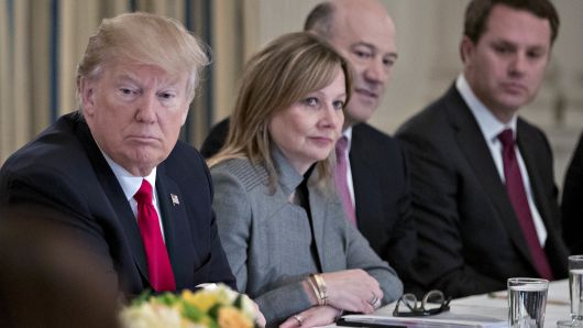 President Donald Trump, left, listens during a Strategic and Policy Forum meeting with business leaders and White House advisors in the State Dining Room of the White House in Washington, D.C., U.S., on Friday, Feb. 3, 2017.