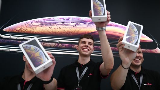 Store shop assistants as Apple launches iPhone XS, iPhone XS Max, and iPhone XR sales in Russia. 