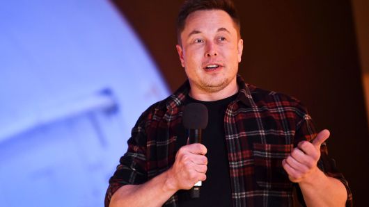Tesla founder Elon Musk speaks at the unveiling event by "The Boring Company" for the test tunnel of a proposed underground transportation network across Los Angeles County, in Hawthorne, California, December 18, 2018.