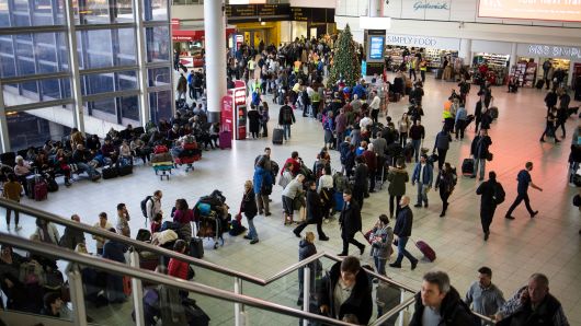 Passengers wait for announcements at Gatwick South Terminal on December 20, 2018 in London, England. Authorities at Gatwick closed the runway after drones were spotted over the airport on the night of December 19.