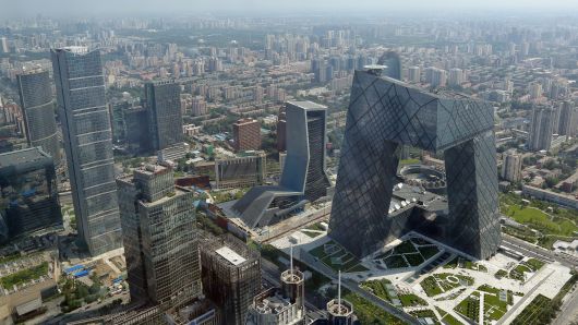 A general view shows the headquarter of China Central Television amid the Beijing skyline at central business district on August 3, 2013 in Beijing, China.