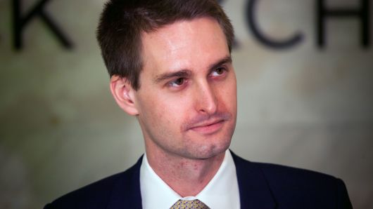 Evan Spiegel, co-founder and chief executive officer of Snap Inc., stands on the floor of the New York Stock Exchange during the company's initial public offering on Thursday, March 2, 2017.