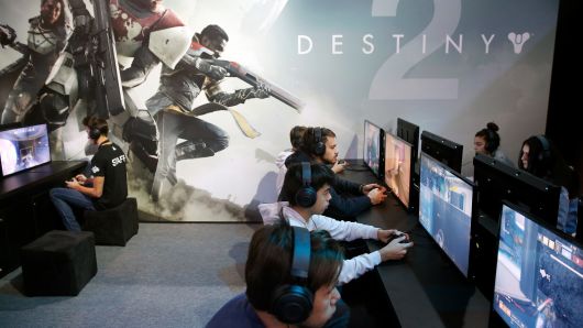 Gamers play the video game 'Destiny 2' developed by Bungie Studios and published by Activision during the 'Paris Games Week' on October 31, 2017 in Paris, France.