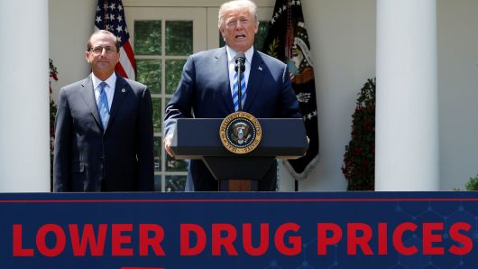 Health and Human Services Secretary Alex Azar listens as U.S. President Donald Trump delivers a speech about lowering prescription drug prices from the Rose Garden at the White House in Washington, U.S., May 11, 2018.