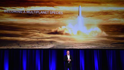 Billionaire entrepreneur and founder of SpaceX Elon Musk speaks at the 68th International Astronautical Congress 2017 in Adelaide on September 29, 2017.