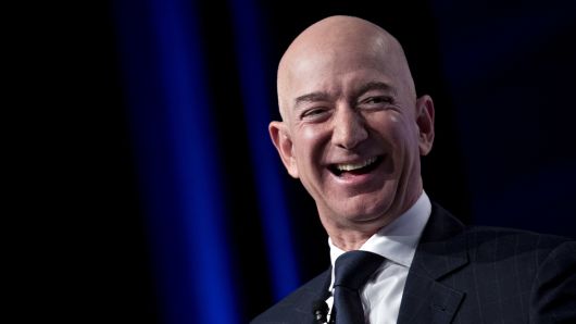 Amazon CEO Jeff Bezos laughs at a discussion at the Air Force Association's Air, Space and Cyber Conference in National Harbor, Md., Sept. 19, 2018.