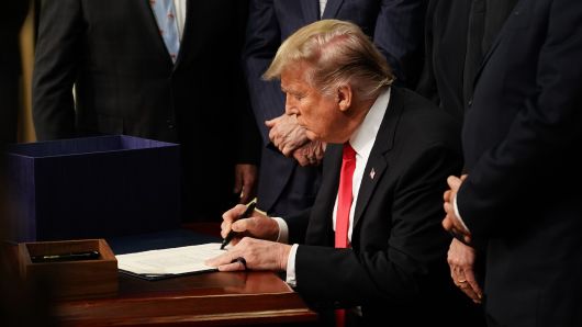 US President Donald Trump participates in a signing ceremony for the Agriculture Improvement Act of 2018 at the White House on December 20, 2019 in Washington, DC.