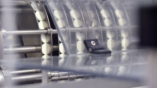Tablets are pictured on the production line of Bristol Myers Squibb's pharmaceutical plant of French group UPSA.