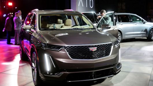 Members of the media look at General Motors 2020 Cadillac XT6 SUV after it was revealed on the eve of press days of the North American International Auto show in Detroit, Michigan, January 13, 2019.