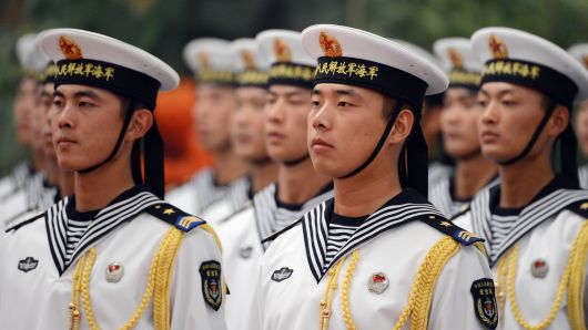 Chinese sailors form an honor guard during a welcoming ceremony at the Great Hall of the People in Beijing on September 6, 2012.