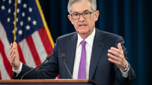 Federal Reserve Board Chairman Jerome Powell arrives to speak at a press conference after the Fed announced interest rates would remain unchanged, in Washington, DC, January 30, 2019.