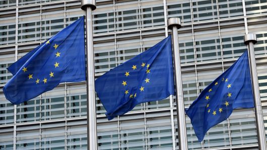 European Union flags hang outside the European Commission Headquarters on March 10, 2017 in Brussels, Belgium.