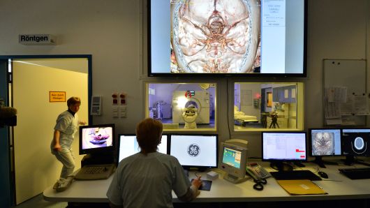 An examination with a CT scanner is prepared in the emergency room of the university hospital (UKJ) in Jena, Germany. The GE Healthcare scanner is called the Revolution CT.